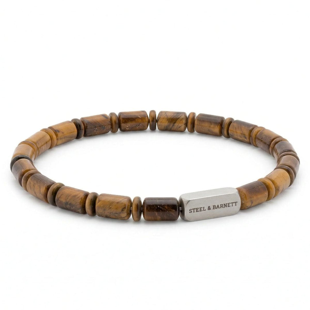 Niche Jewellery Steel & Barnett tiger eye barrel bead bracelet with a brushed stainless steel logo accent.