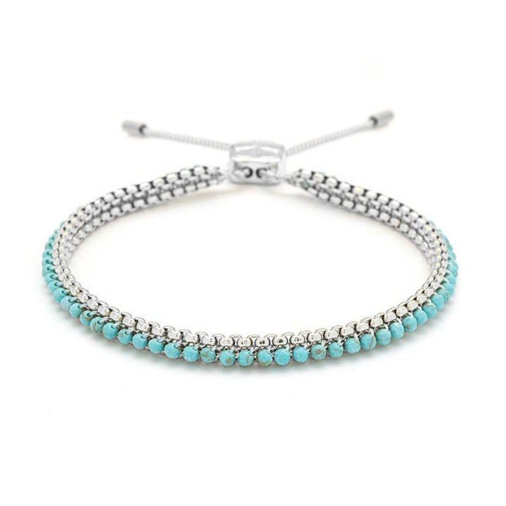 Niche Jewellery Boho Betty Zena bracelet featuring turquoise howlite beads and silver-plated chain detail.