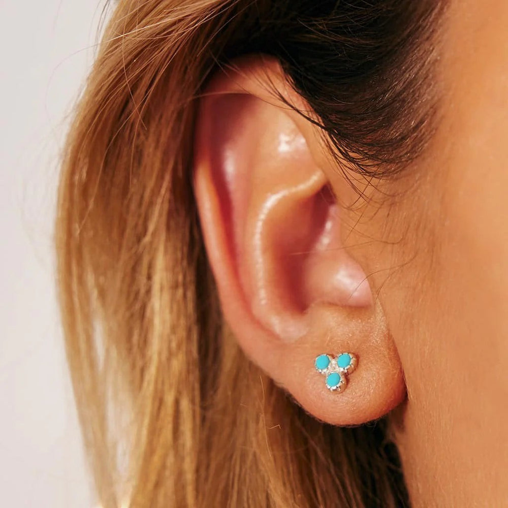 Niche Jewellery Charlotte's Web Threeni stud earrings featuring three turquoise stones set in sterling silver.