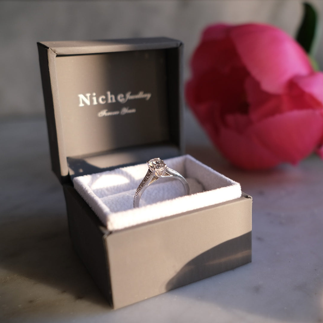 Oval Cut Diamond Solitaire Ring with Vintage Style Shoulders