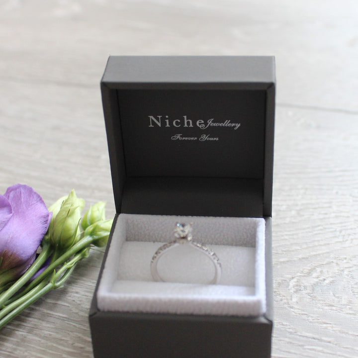 Brilliant Cut Engagement Ring with Knife Edge Band