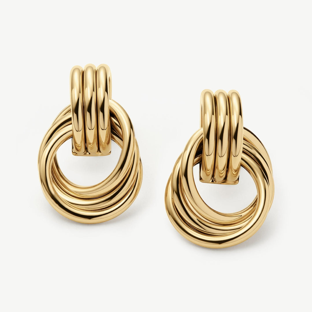 Niche Jewellery gold knot statement stud earrings with a contemporary twist design, water-safe and tarnish-resistant.