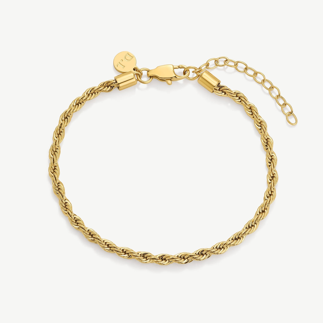 Niche Jewellery D.Louise gold rope chain bracelet with adjustable clasp and D.L. charm. Water-resistant.