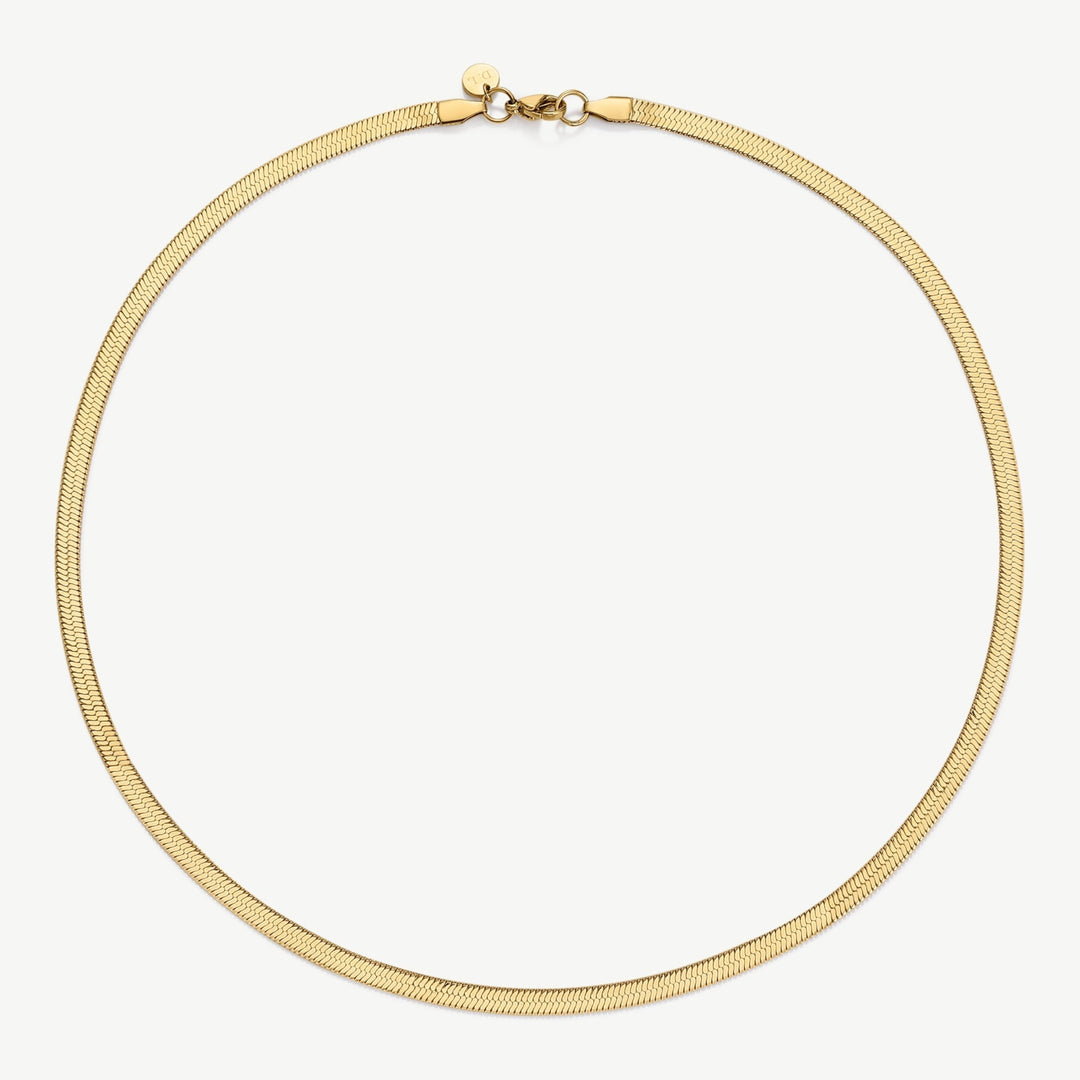 Niche Jewellery gold snake chain necklace with a herringbone pattern. Delicate and waterproof, perfect for everyday wear.