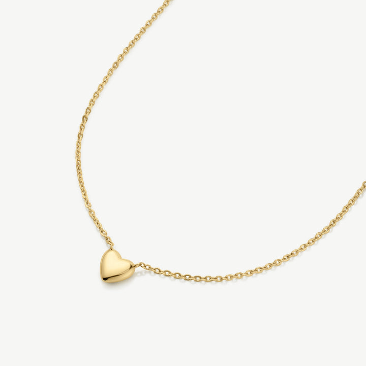 Niche Jewellery mini gold heart pendant necklace on a fine, waterproof chain. Simple, timeless, and perfect for layering.
