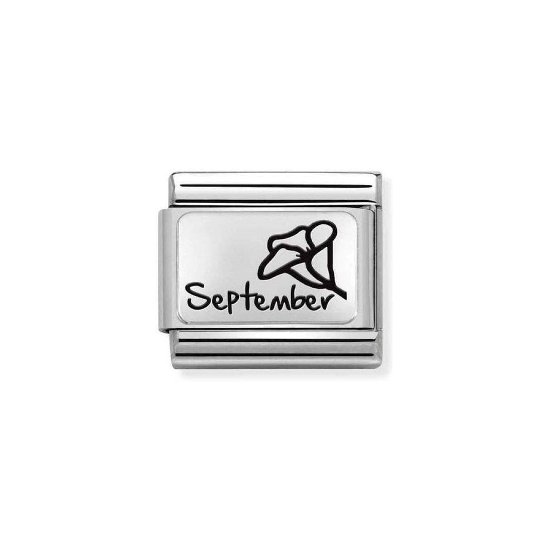 Niche Jewellery silver charm with black enamel engraving of the September birth flower, Morning Glory, and the word September.
