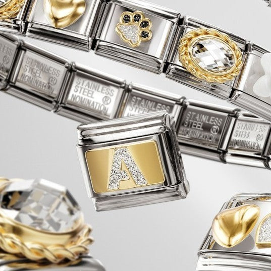 Niche Jewellery Nomination Classic gold charm with glitter letter A on a gold background and stainless steel base.