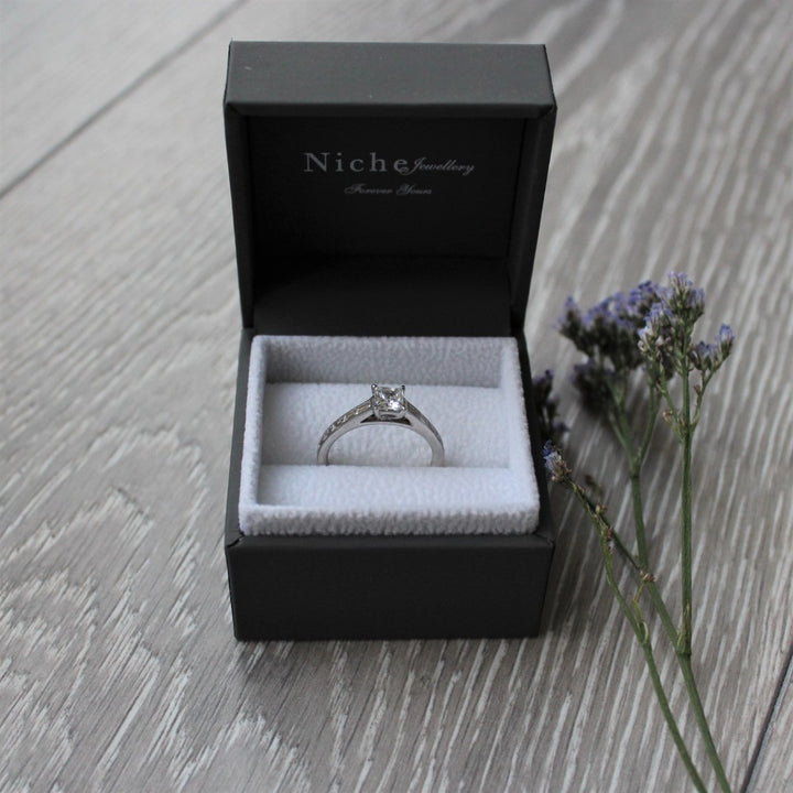 Princess Cut Diamond Solitaire with Baguette Shoulders