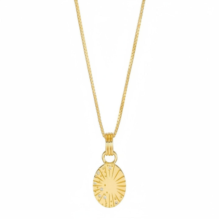 Rachel Jackson gold necklace with Art Deco sun pendant scattered with white sapphires on an adjustable box chain.