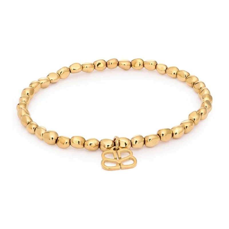 Niche Jewellery Boho Betty Saffron gold stretch bracelet with pebble beads and butterfly charm.