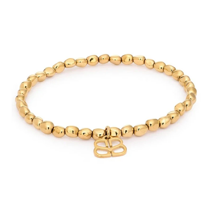 Niche Jewellery Boho Betty Saffron gold stretch bracelet with pebble beads and butterfly charm.