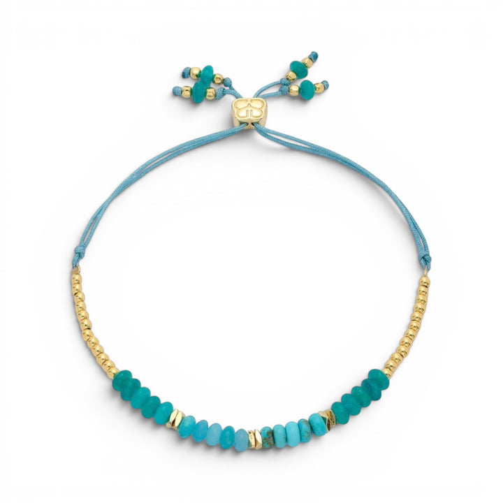 Niche Jewellery: Boho Betty Serena adjustable bracelet with turquoise howlite, jade gemstones and gold-plated accents.