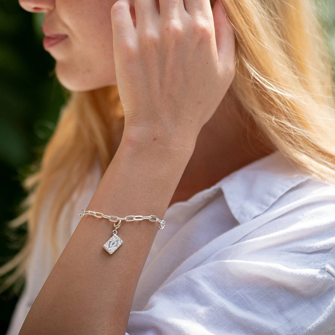 Lily Charmed Chunky Oval Link Charm Silver Bracelet. Item code CBRSCNKOV
