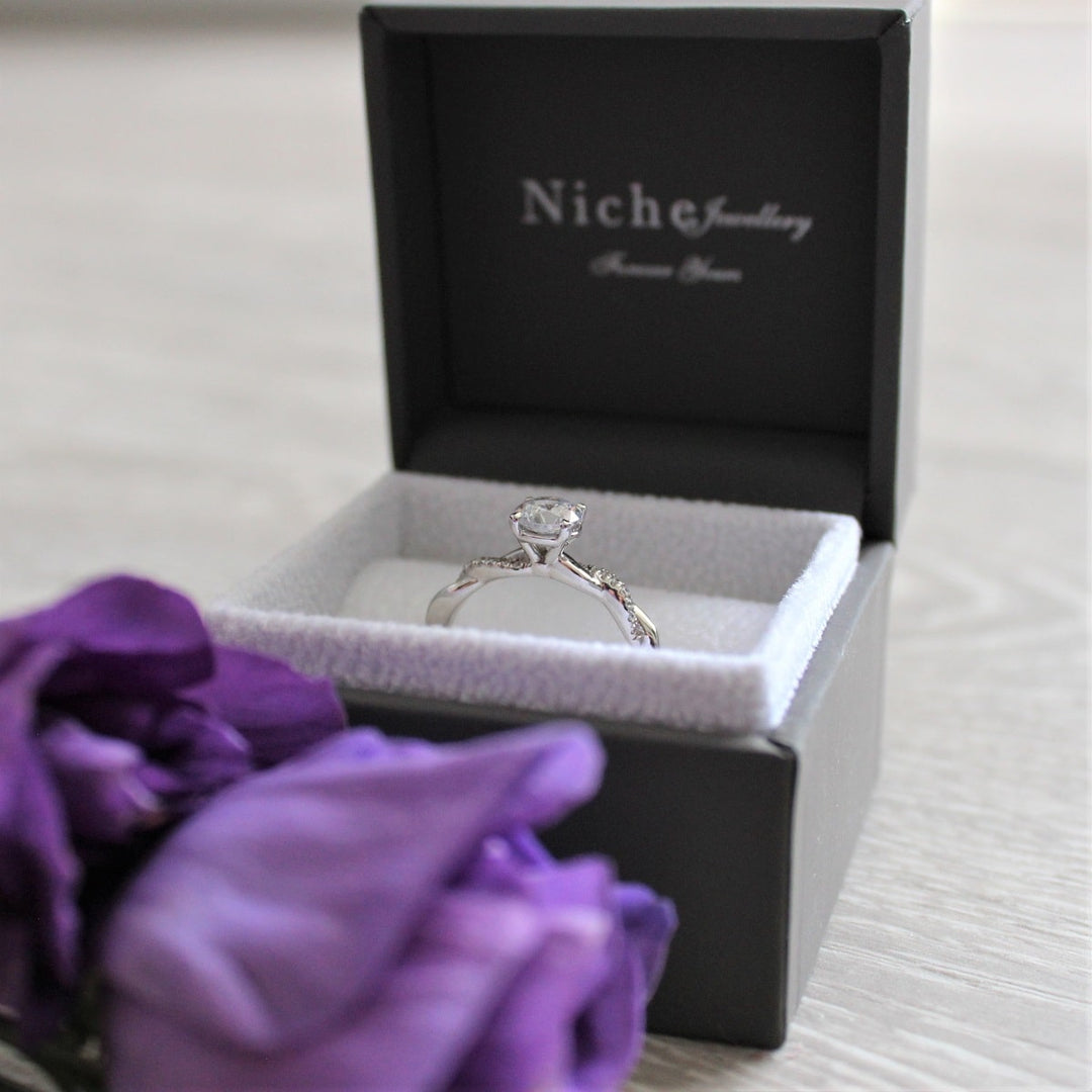 Brilliant Cut Engagement Ring with Twist Band